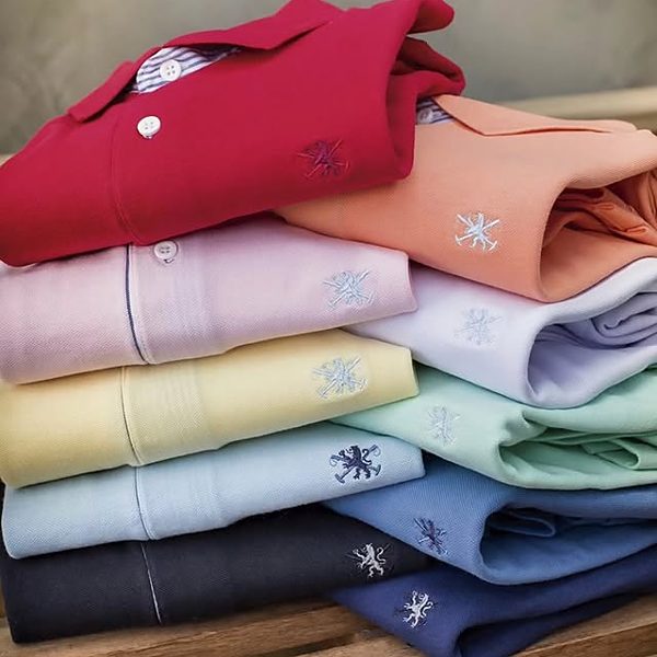 Polos masculinas coloridas dobradas, do P ao G3 — linha plus size no Instagram da loja